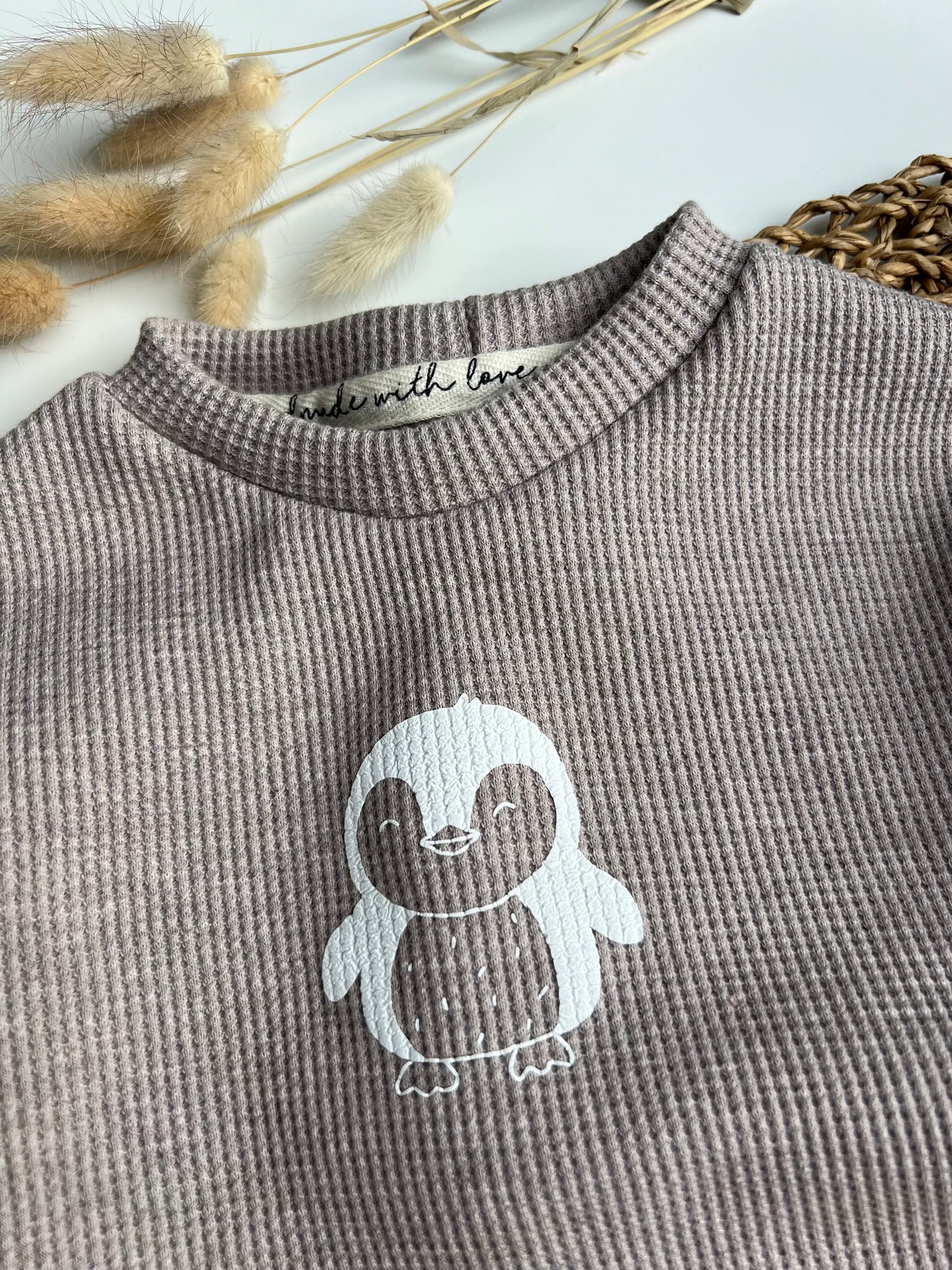 Lässiger Pinguinpullover